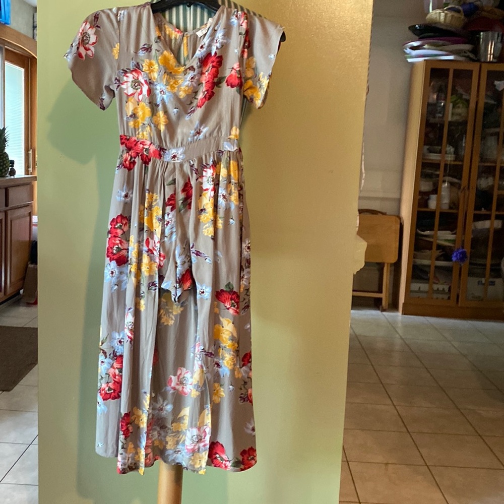 Angie girls floral romper dress. Size Medium.